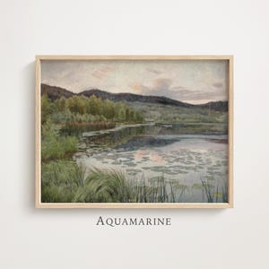 May include: A framed landscape painting depicting a tranquil lake scene with mountains in the background. The artwork shows a calm body of water with lily pads, verdant greenery, and a soft, muted colour palette. The word "AQUAMARINE" is printed at the bottom.