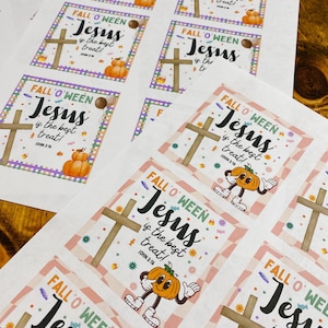 May include: Sheets of stickers with the text "FALL O'WEEN Jesus is the best treat!" and a cross graphic. The stickers feature a cartoon pumpkin character and the Bible verse John 3:16. The stickers have a pink and white checkered border.