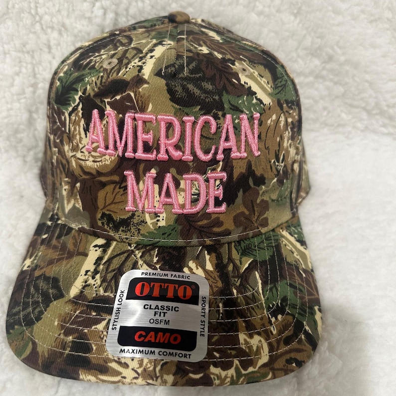 May include: A set of three ceramic mugs with a speckled, matte finish. The mugs are in shades of cream, light brown, and dark brown. Each mug has a simple, minimalist design, perfect for coffee or tea.