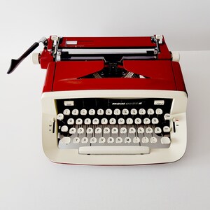 Typewriter &quot;Mädi 3000 S&quot; with original case and key 70s
