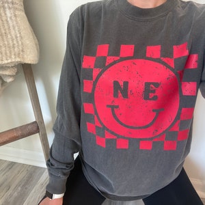 Nebraska smiley face checkered long sleeve or crewneck