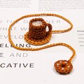 Crochet Coffee Cup Bookmark, Pineapple Donut Tassel, Gift for Readers product logo