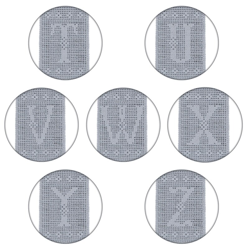 May include: Six silver-colored, round, decorative doilies with a delicate, intricate pattern.