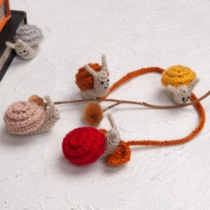 handmade crochet snail bookmark, amigurumi for booklovers, cute cottagecore animal plushie gift ideas image 2