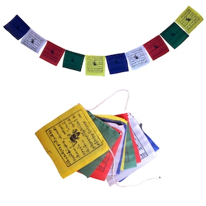 May include: A set of colourful prayer flags with Tibetan writing and a small pile of folded prayer flags with a string attached.