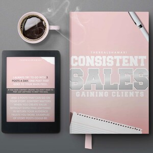 May include: A pink book with the title "Consistent Sales: Gaining Clients" in white and silver lettering. The book is open to a page with text about posting consistently on social media.