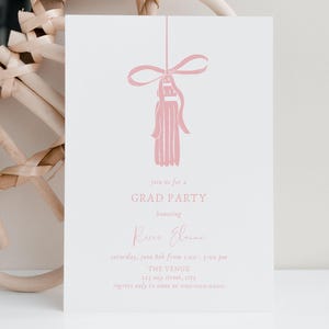 May include: A white graduation party invitation with pink text and a tassel illustration. The invitation includes the text "GRAD PARTY" and the name "Reece Elaine". The event details are also included.