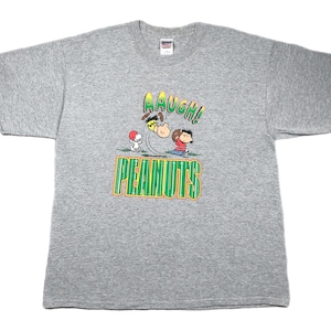 Vintage 90s/Y2K Peanuts “A Boy Named Charlie Brown” Football Kick Meme Graphic T-Shirt Size XL
