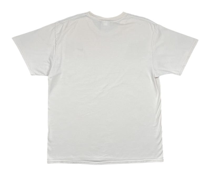 May include: A plain, off-white, short-sleeved t-shirt. The shirt is made of a soft, slightly wrinkled fabric. The neckline is a classic crew neck. The sleeves are short and extend to the mid-upper arm. The shirt is laid flat on a white background.