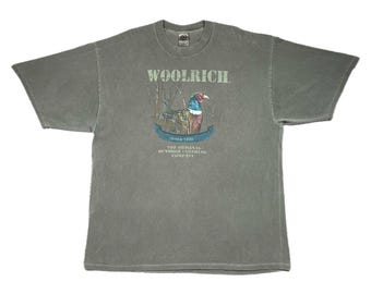 Vintage 90s/Y2K Woolrich “The Original Outdoor Clothing Company” Duck T-Shirt (XL/XXL)