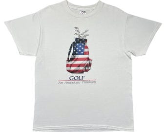 Camiseta vintage de golf de los años 90/año 2000 con bandera y bolsa de golf "An American Adventure" (talla mediana)
