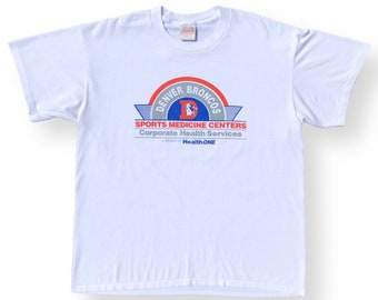 Vintage 90s Denver Broncos “Sports Medicine Center” NFL Graphic T-Shirt Size Large/XL