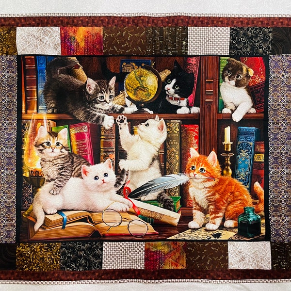 Adorable Cat quilt with 7 cats n kitties! Many adorable blocks in warm  colors . Perfect lap quilt  34" x 44". Cats play on book case