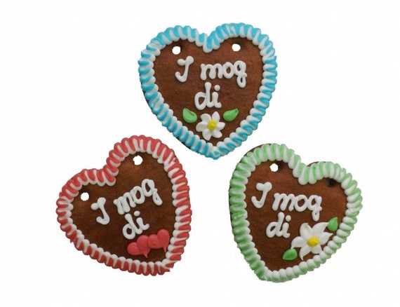 Gingerbread hearts, 60 in a box, saying "I mog di" (I like you), 10 cm with colorful edges