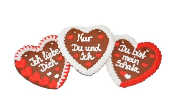 Oktoberfest gingerbread hearts with love-themed sayings, assorted, 20 pieces per box