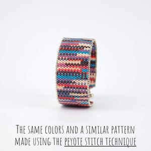 May include: A wide, beaded bracelet with a silver-coloured metal frame. The bracelet features a colourful pattern of red, blue, purple, and beige beads. The text at the bottom reads: "THE SAME COLORS AND A SIMILAR PATTERN MADE USING THE PEYOTE STITCH TECHNIQUE."