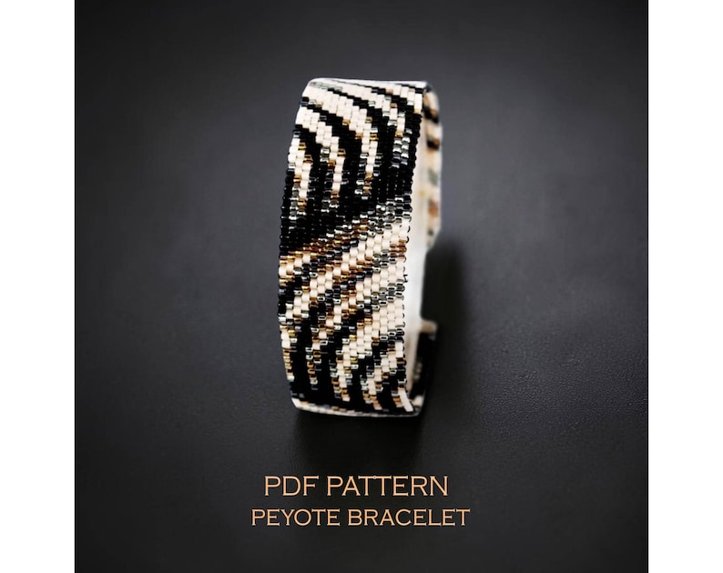 A wide peyote cuff bracelet with a sophisticated, 3D pattern of wavy organic stripes in black, cream, and olive green, named 'Madame No.1'. A timeless, classic beadwork pattern by Crafty Bead.