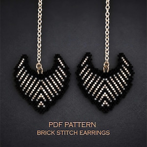 May include: A pair of brick stitch earrings featuring a chevron pattern made of black and metallic silver beads. Each earring hangs from a thin gold-tone metal chain. The text PDF PATTERN BRICK STITCH EARRINGS is printed in light orange at the bottom.