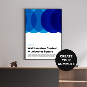May include: A poster with a blue and white abstract design. The poster has the text "Walthamstow Central → Leicester Square" and "Create Your Commute".