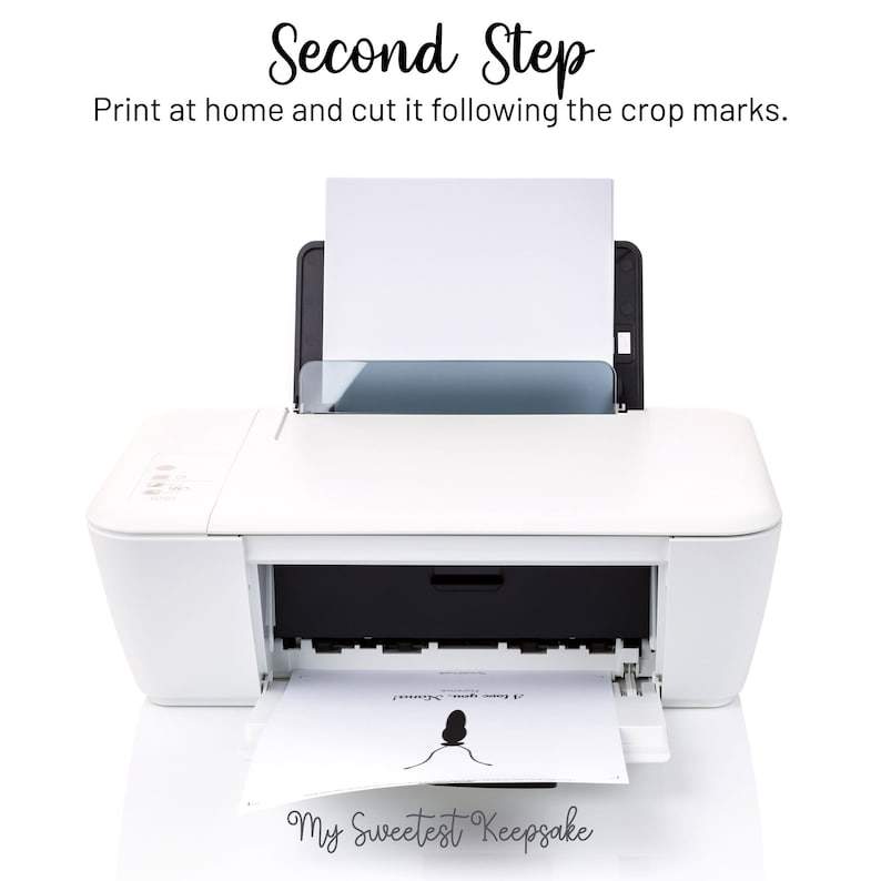May include: A white printer with a sheet of paper in the output tray. The paper has a black silhouette of a person with the text "My Sweetest Keepsake" printed on it. The text "Second Step" is printed above the printer. The text "Print at home and cut it following the crop marks." is printed below the printer.