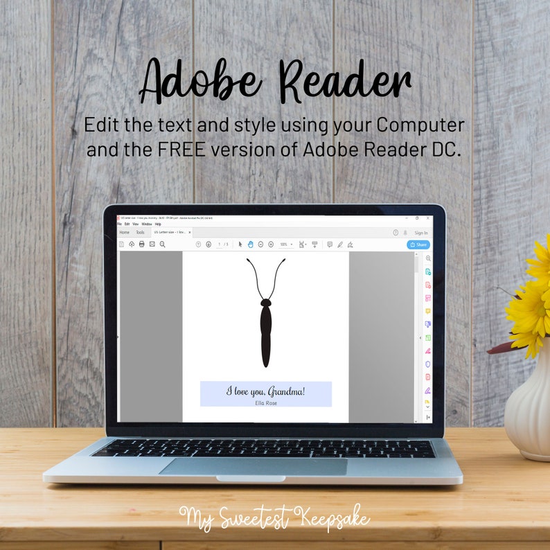 May include: A laptop computer displaying a document with a black silhouette of a butterfly and the text "I love you, Grandma!" with the name "Ella Rose" below. The document also has the text "My Sweetest Keepsake" at the bottom.