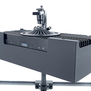 May include: Black aquarium light fixture with a control panel and a fan. The light is mounted on a black stand.