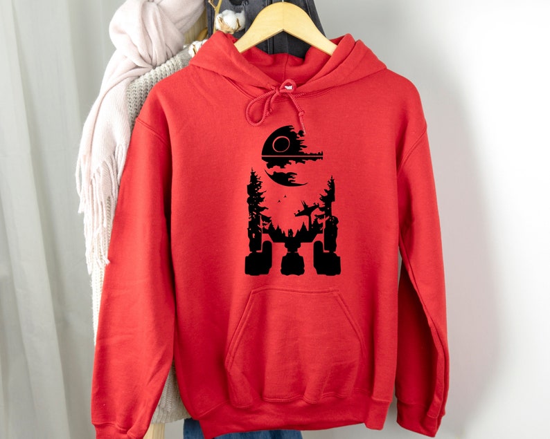 May include: Red hooded sweatshirt with a black silhouette of the Death Star from Star Wars.
