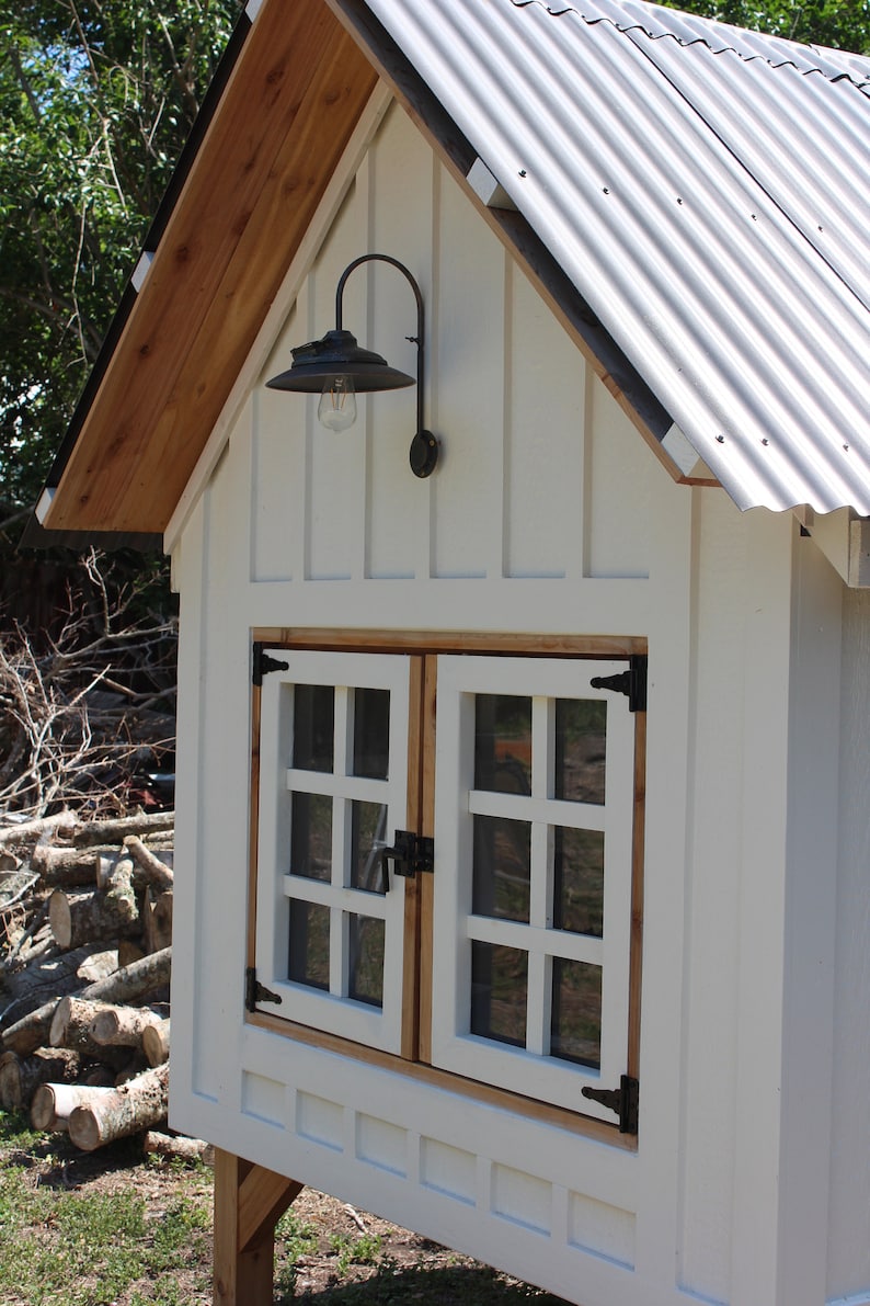 A close up of the BnB chicken coop, the plans show how to add the solar powered light, and how to build the french doors that keep your chickens safe at night.