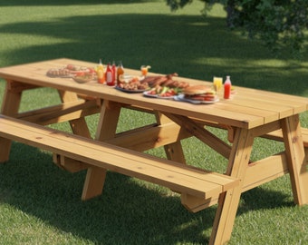May include: A wooden picnic table with two benches, set up on a grassy lawn. The table is set with food and drinks, including sandwiches, chips, and drinks.
