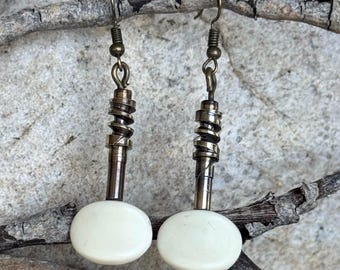 Custom guitar peg dangle earrings.