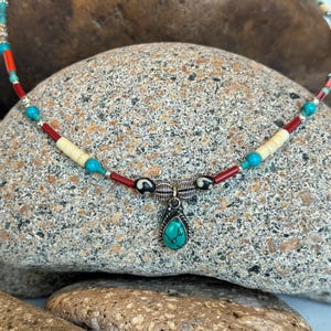 Turquoise and antique glass and silverbead necklace. Quality crafted from vintage estate jewelry.