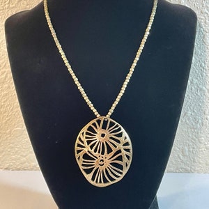 Kenneth Cole Reaction 16&quot; hangende ketting met 1-1/2&quot; extender, bleke matgouden toon, handtekening hangtag.