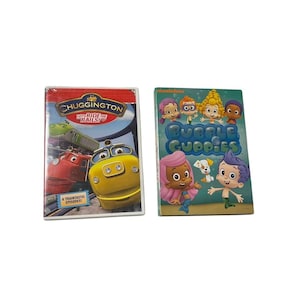 May include: Two DVD cases, one featuring the cartoon show 'Chuggington' with the text 'Let's Ride the Rails!' and the other featuring the cartoon show 'Bubble Guppies'.