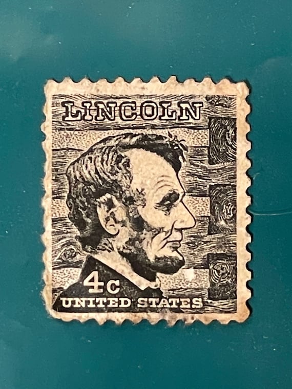 Vintage Uncirculated 1965 Lincoln 4c Black Engraved Stamp, F / VF