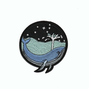 May include: A blue whale leaps from the water, with a palm tree in the background. The scene is set against a black background with white stars.