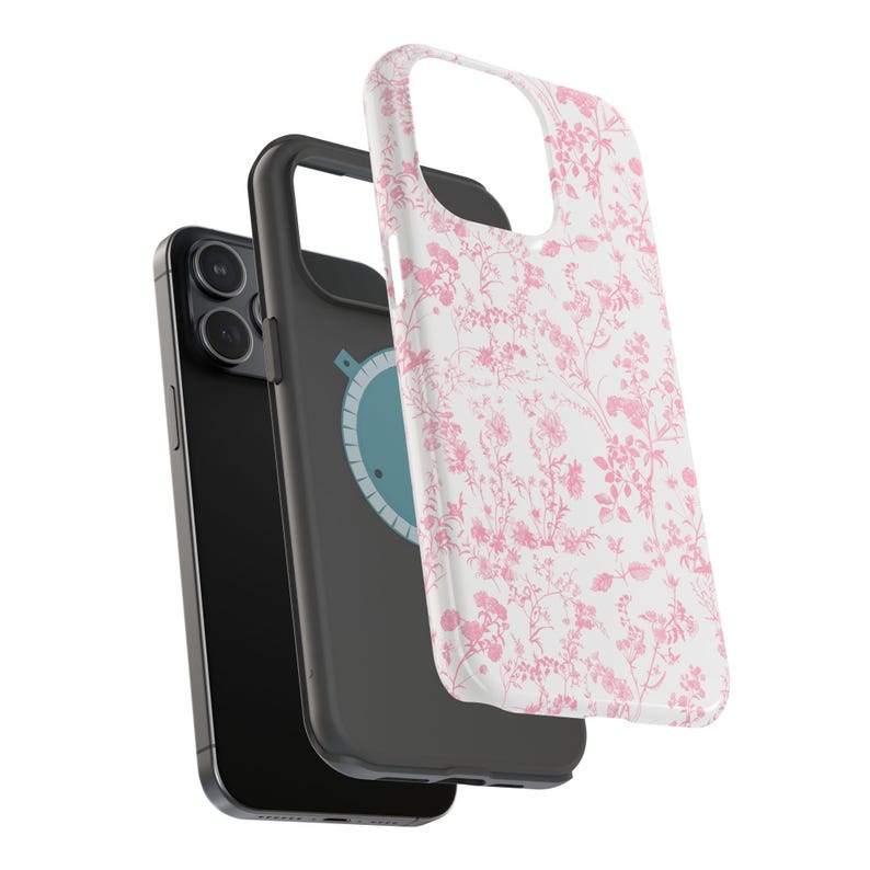 Pode incluir: Uma capa de telefone branca com um padr&atilde;o floral rosa. A capa &eacute; mostrada com um telefone preto dentro.