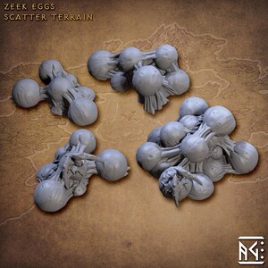 May include: Four clusters of grey Zeek Eggs scatter terrain for tabletop gaming. Each cluster features multiple spherical egg-like shapes connected by textured, web-like strands. The text Zeek Eggs Scatter Terrain is visible in the top left corner.