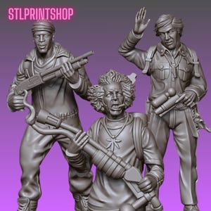 May include: Three detailed gray figurines of people, each holding a weapon. One figure is raising a hand, another is holding a shotgun, and the third is holding a large weapon with a marijuana leaf pendant. The text "STLPRINTSHOP" is at the top.