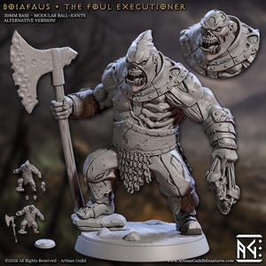 May include: A gray, detailed miniature figure of a monstrous warrior, holding a large axe and severed skulls. The figure is on a circular base, with additional miniature figures and text visible. The text reads "BOIAFAUS + THE FOUL EXECUTIONER".