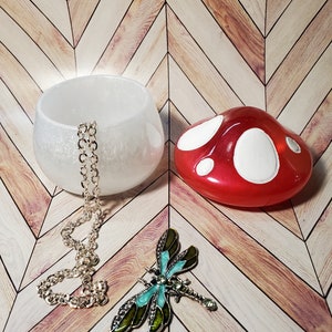 Red and white whimsical resin art mushroom, fungi jar with lid to store jewelry, cottage core handcrafted stash jar, versatile storage.