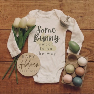 digital pregnancy announcement. long sleeve baby onesie that reads "some bunny sweet is on the way" with a wooden circle including last name and due date of baby. digital download