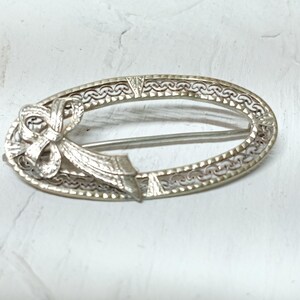 Antique Oval Filagree Sterling Silver Ribbon Brooch