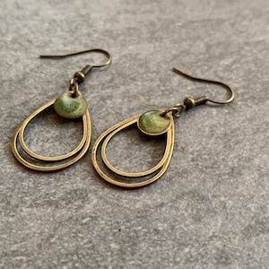 Minimalist hanging earrings with green resin image 2