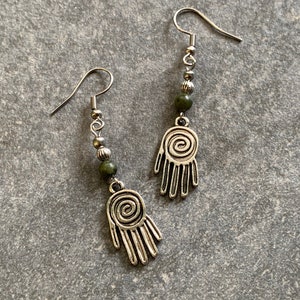 Hanging earrings, healing hand design with green jade, spiral earrings