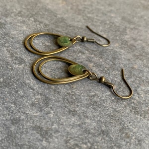 Minimalist hanging earrings with green resin image 7