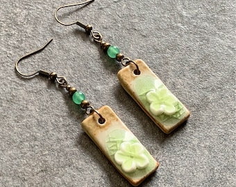 Green ceramic earrings with flower