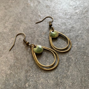 Minimalist hanging earrings with green resin image 3