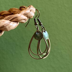 Minimalist hanging earrings with green resin image 9