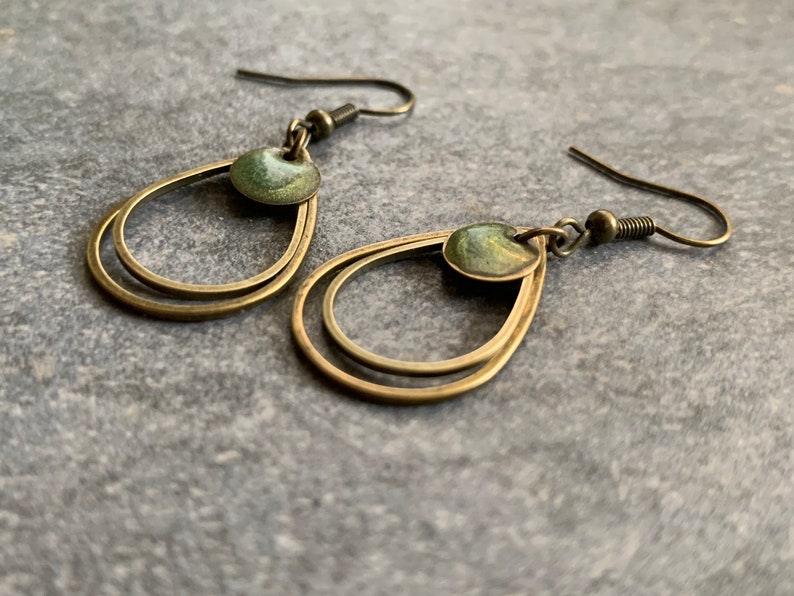 Minimalist hanging earrings with green resin image 1