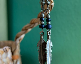 Bronze feather earrings with black glass beads